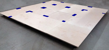 Springed panels with top offset layer